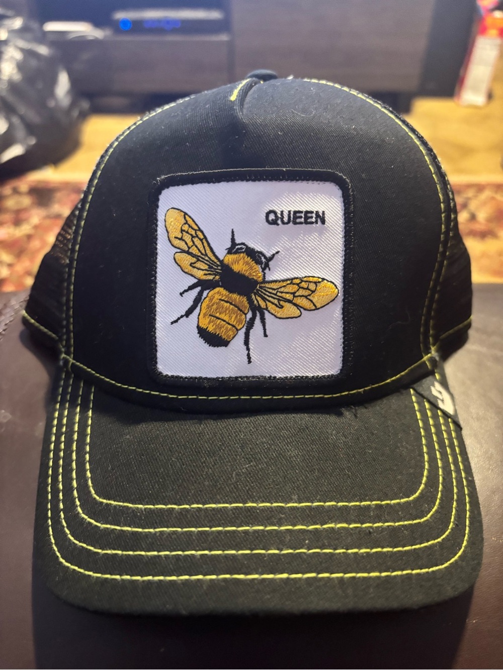 Goorin Bros Black Mesh Trucker Cap with Yellow Stitching